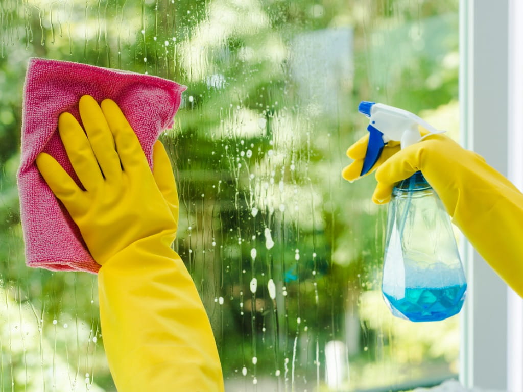 Cleaning Glass With Windex